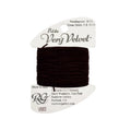 Brown thread on a Rainbow Gallery packaging with a white background
